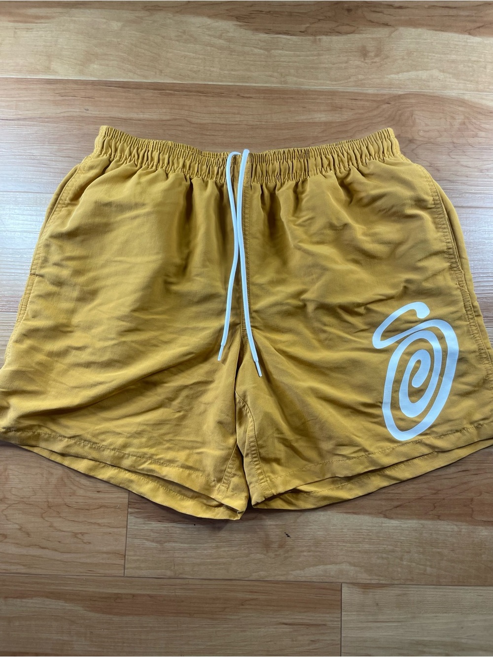 Stussy Mustard Yellow Athletic Shorts with White Swirl